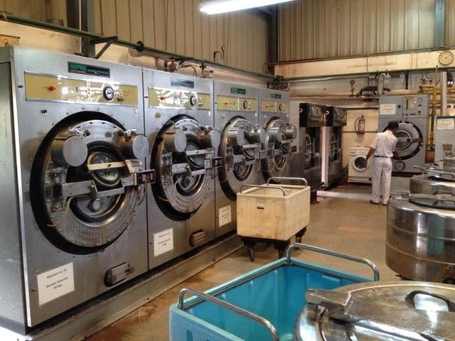 Launderaids smaller washing machine processing hotel laundry